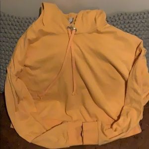 Cropped style hoodie in mustard yellow